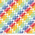 Colorful diamond pattern fabric with a ruler at the bottom