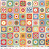 Colorful quilt pattern with geometric shapes on a fabric swatch.