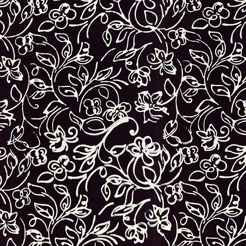 A repeating black and white floral vine pattern fills the frame, with white line-art flowers and leaves on a black background.