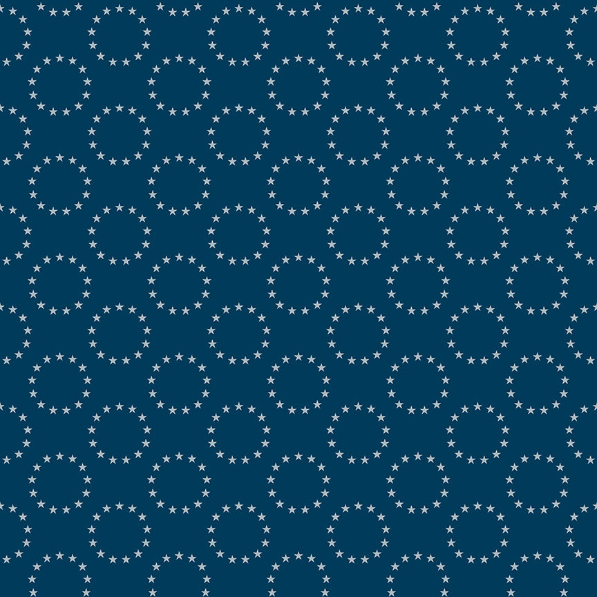Pattern of white circles and stars on a blue background