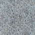 A close-up of a woven textile pattern with a light gray base and dark brown intersecting lines and small heart-like motifs.