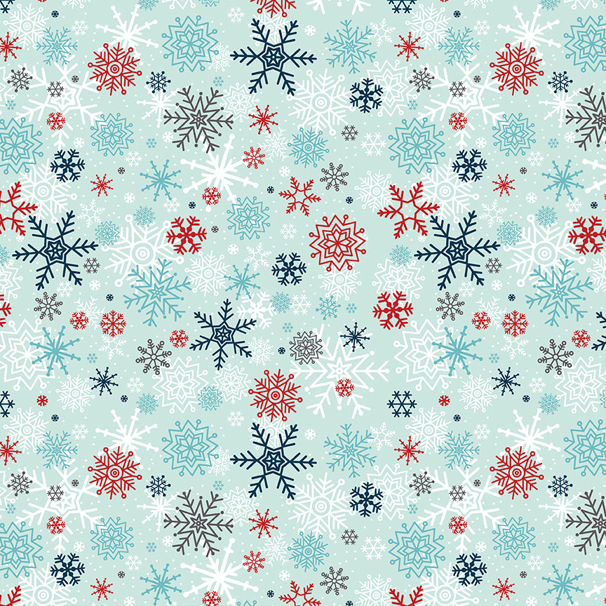 Pattern of colorful snowflakes on a light blue background