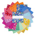 Stack of colorful fabric squares with a brand label on a white background