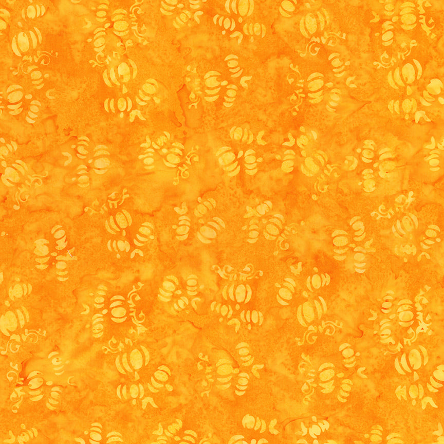Orange fabric with small pumpkins pattern