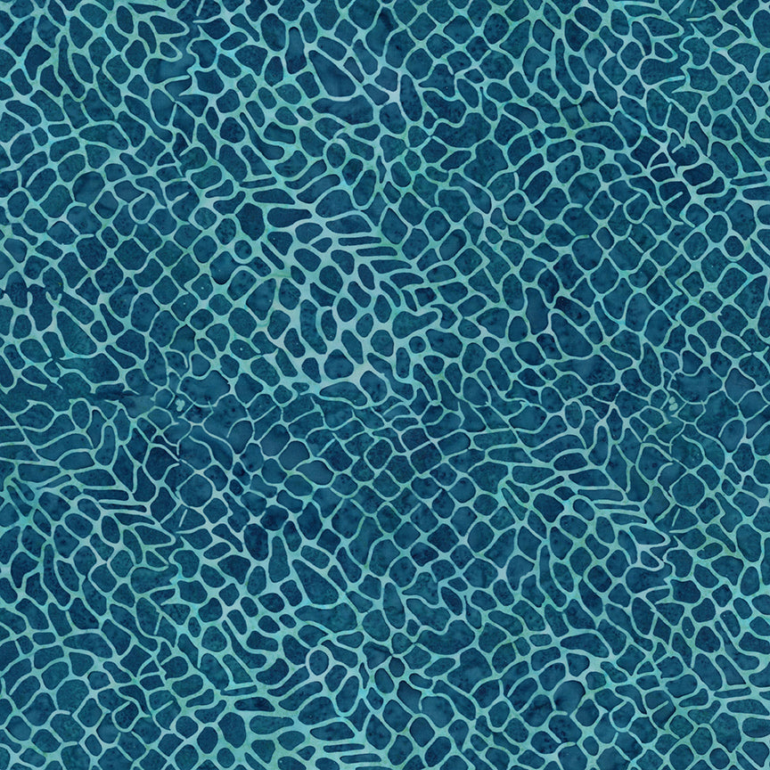 A close-up of a blue and teal patterned surface with an irregular, web-like or reptile-scale texture filling the frame.