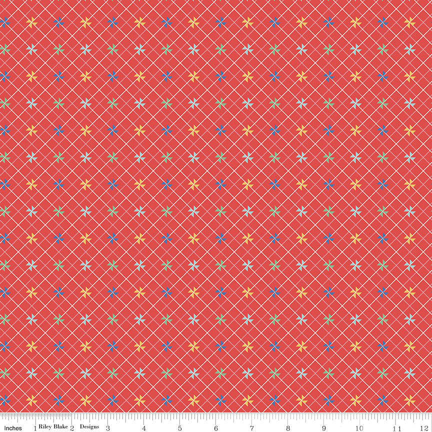 Patterned fabric with small flowers and crosses on a red background