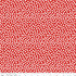 Red fabric with white polka dot pattern, featuring a ruler at the bottom for scale.