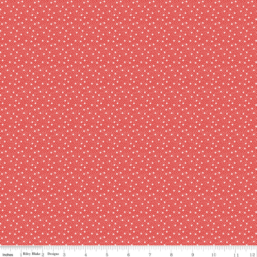 Red fabric with small white stars pattern