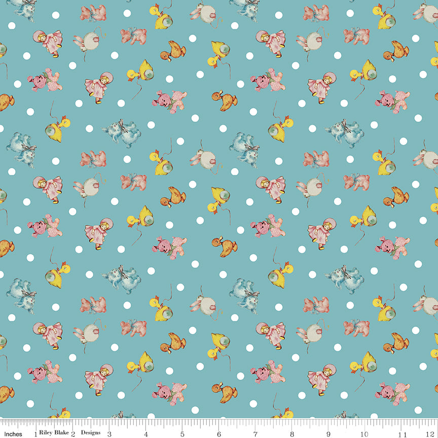 Fabric with cartoon characters on a blue background with white polka dots