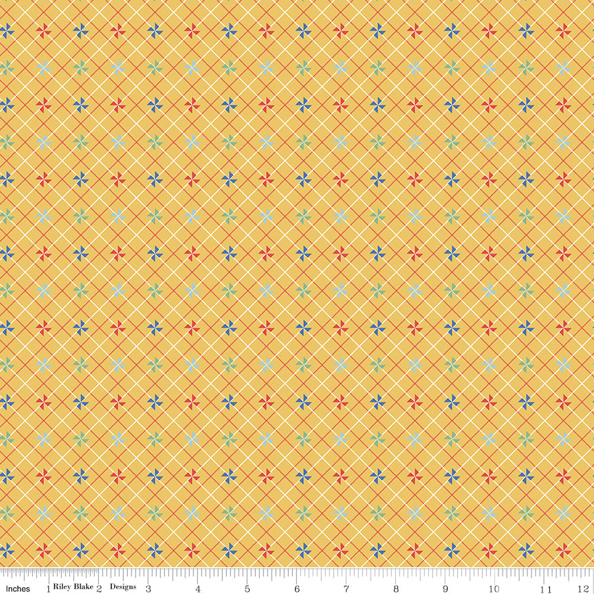 Patterned fabric with small flowers on a yellow background