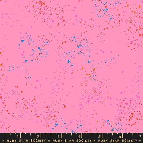Pink fabric with colorful speckles and a ruler at the bottom, featuring Ruby Star Society label.