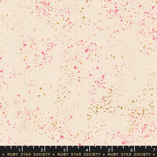 Fabric with pink and gold speckles on a beige background, featuring Ruby Star Society label.