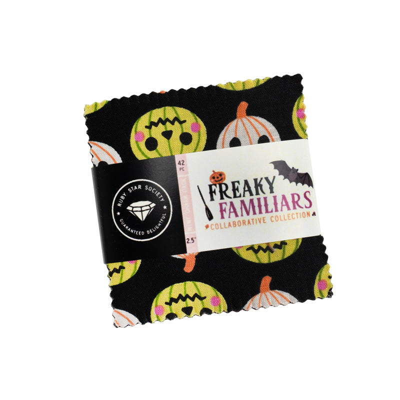 Fabric square with Halloween-themed design and 'Freaky Familiars' label on a white background