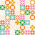 Pattern of colorful geometric shapes on a beige background
