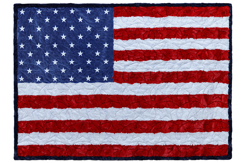 Quilted American flag with stars and stripes on a white background