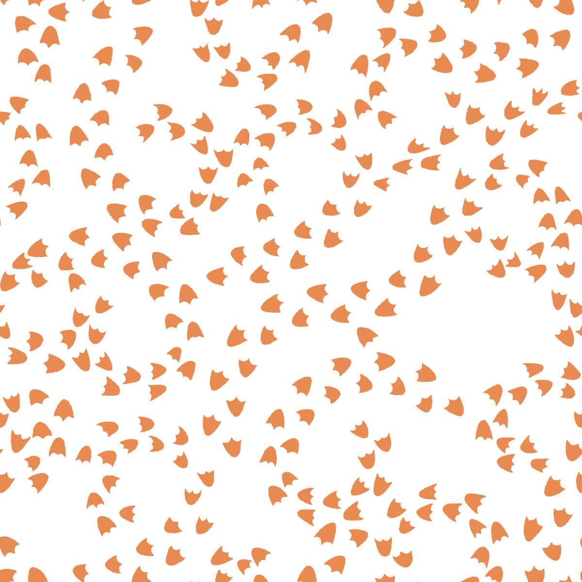 Pattern of small orange shapes on a white background