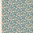 Floral fabric pattern with small flowers on a teal background
