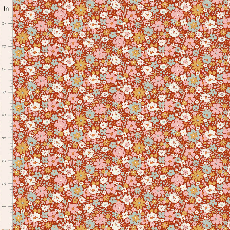 Floral pattern fabric with small flowers on a red background