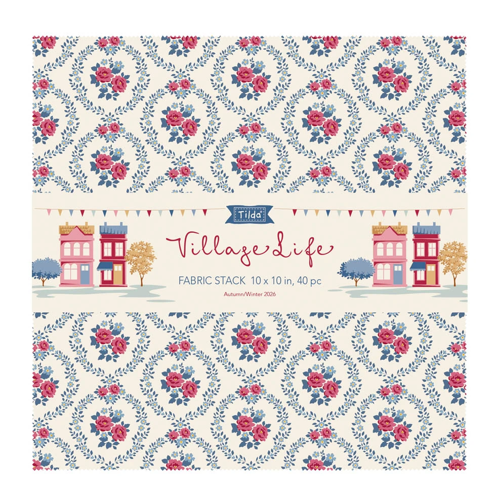 A fabric stack labeled 'Tilda' and 'VillageLife' shown as a 10 x 10 in, 40-piece set. The fabric features a repeating pattern of pink roses and blue foliage in circular wreaths on a cream background, with a central band showing colorful village houses and bunting.
