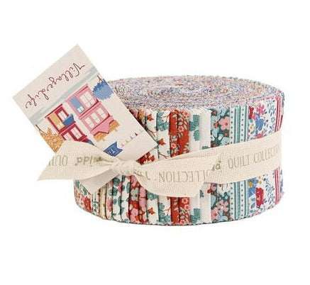 A roll of quilt fabric with a multicolor floral and striped pattern, tied with a cream ribbon and accompanied by a printed paper tag, shown on a plain white background.