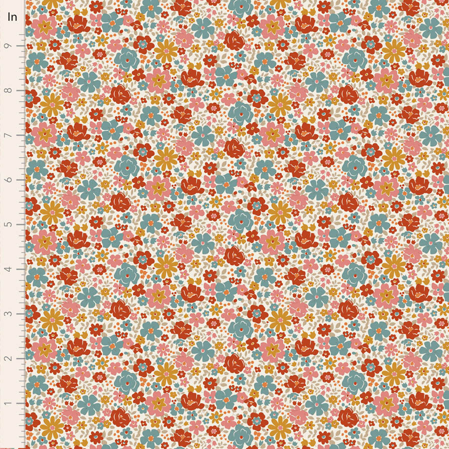 Floral pattern fabric with a ruler for scale on a white background
