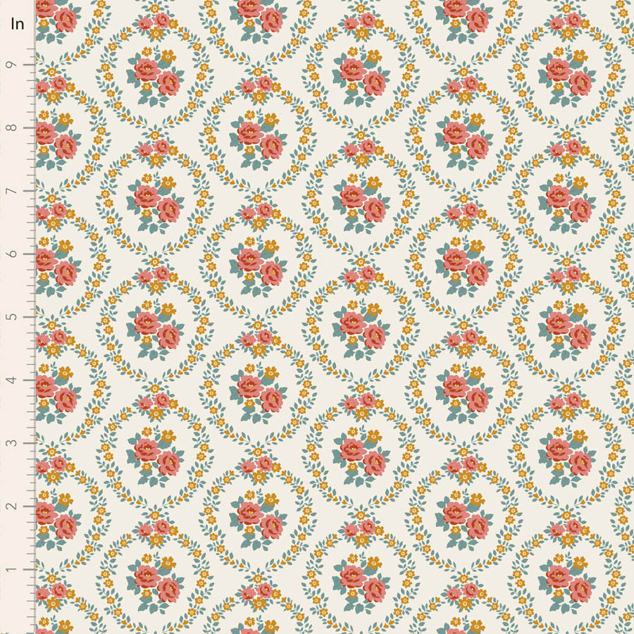 A close-up of a repeating floral fabric pattern on a warm cream background, with a ruler along the left edge showing measurements in inches. The design features coral-pink roses, yellow flowers, and green leaves arranged in a diamond lattice.