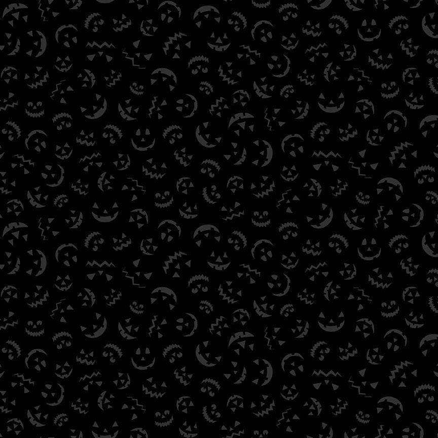 Black background with Jack O Lantern face pattern