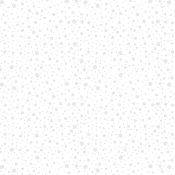 White background with small gray dots