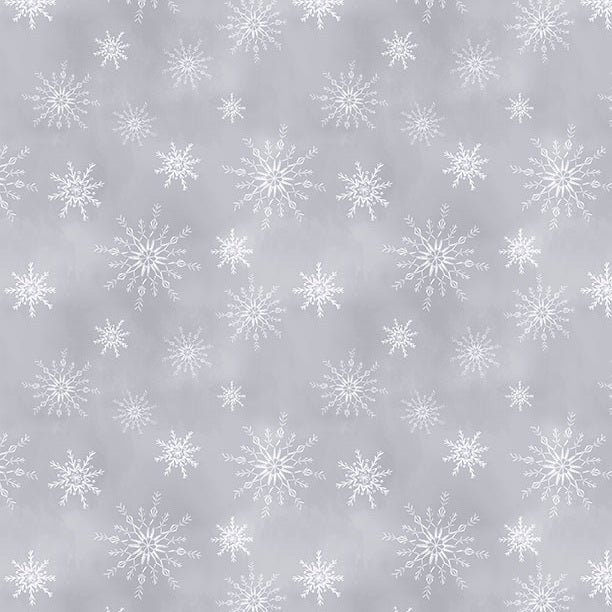 Pattern of white snowflakes on a gray background