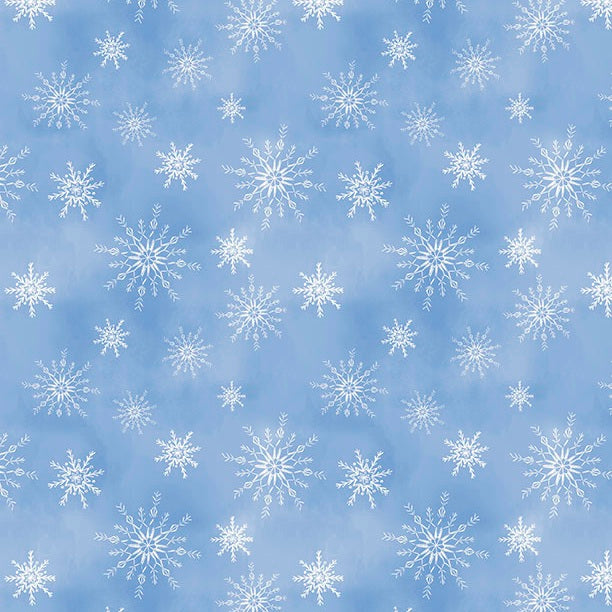 Pattern of white snowflakes on a blue background