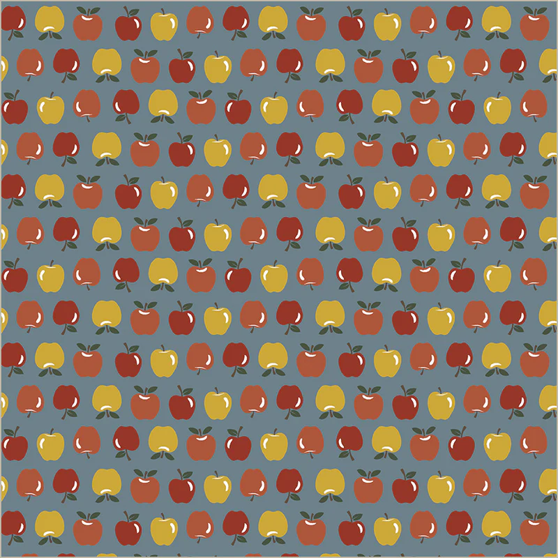 Pattern of red, yellow, and green apples on a blue background