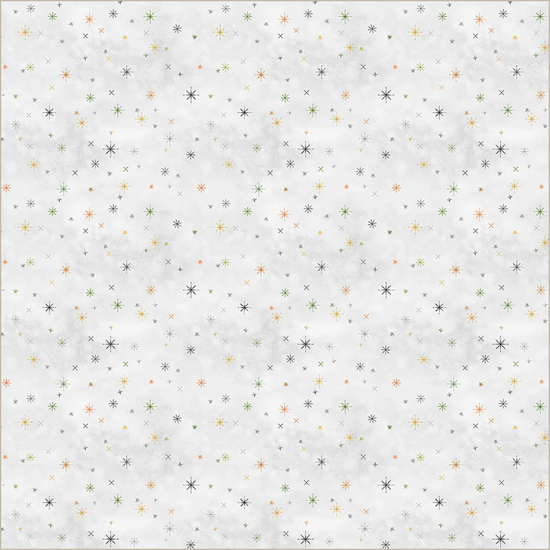 Patterned paper with small stars and dots on a white background