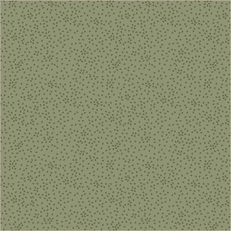 Green patterned fabric with small dots on a green background