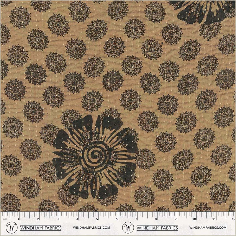 Patterned fabric with black floral designs on a beige background, featuring Windham Fabrics branding.