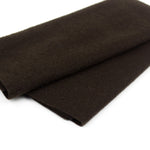 Brown fabric roll on a white background