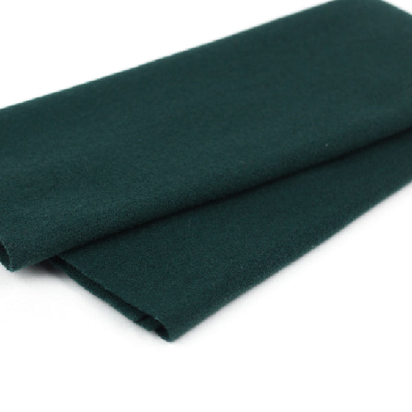 Dark green fabric on a white background