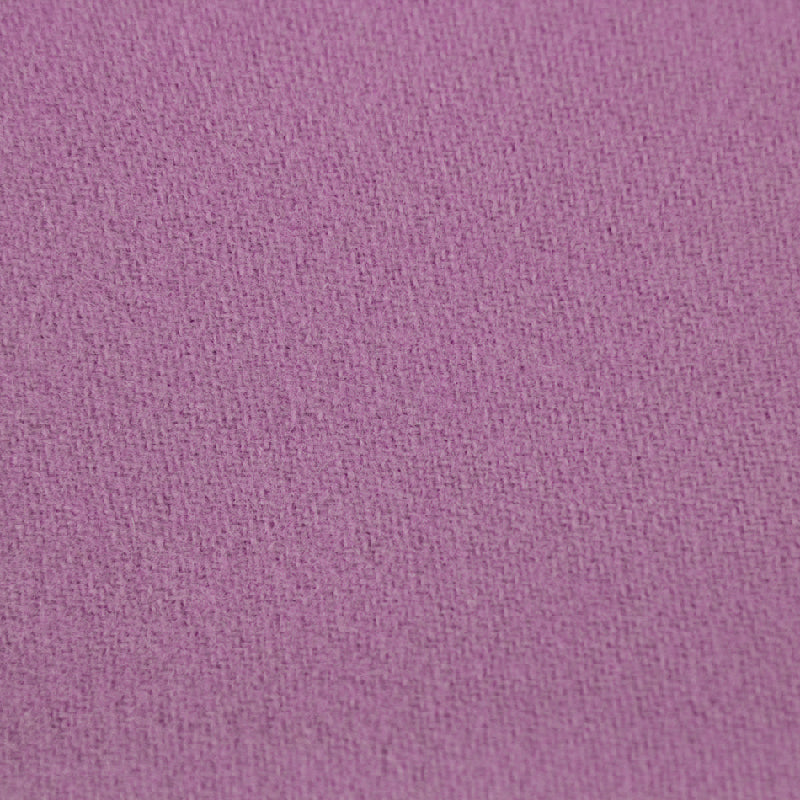 A close-up texture shot of a solid purple woven fabric.