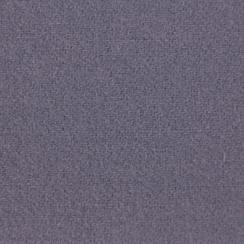 A close-up of a textured fabric swatch in a muted dusty purple or slate lavender color.