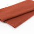 Brown fabric roll on a white background