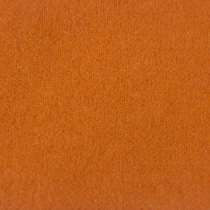 A close-up texture shot of a solid orange fabric, showing a fine woven or knit pattern.