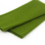 A folded olive green felt fabric napkin or coaster on a plain white background.