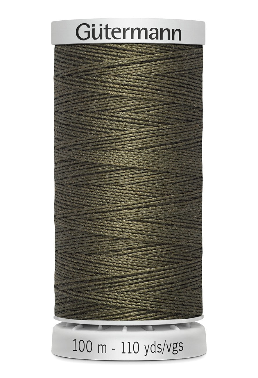 Spool of Gutermann thread on a white background