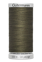 Spool of Gutermann thread on a white background