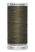 Spool of Gutermann thread on a white background