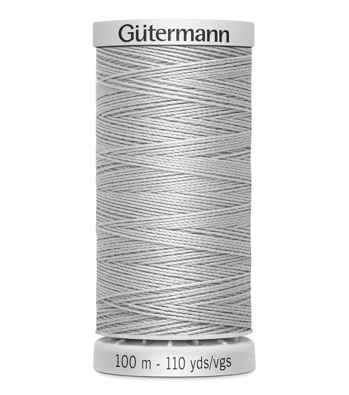 Spool of Gutermann thread on a white background