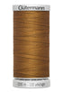 Spool of brown thread with 'Gütermann' branding on a white background
