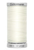 Spool of white thread with 'Gütermann' branding on a white background