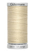 Spool of Gutermann thread on a white background