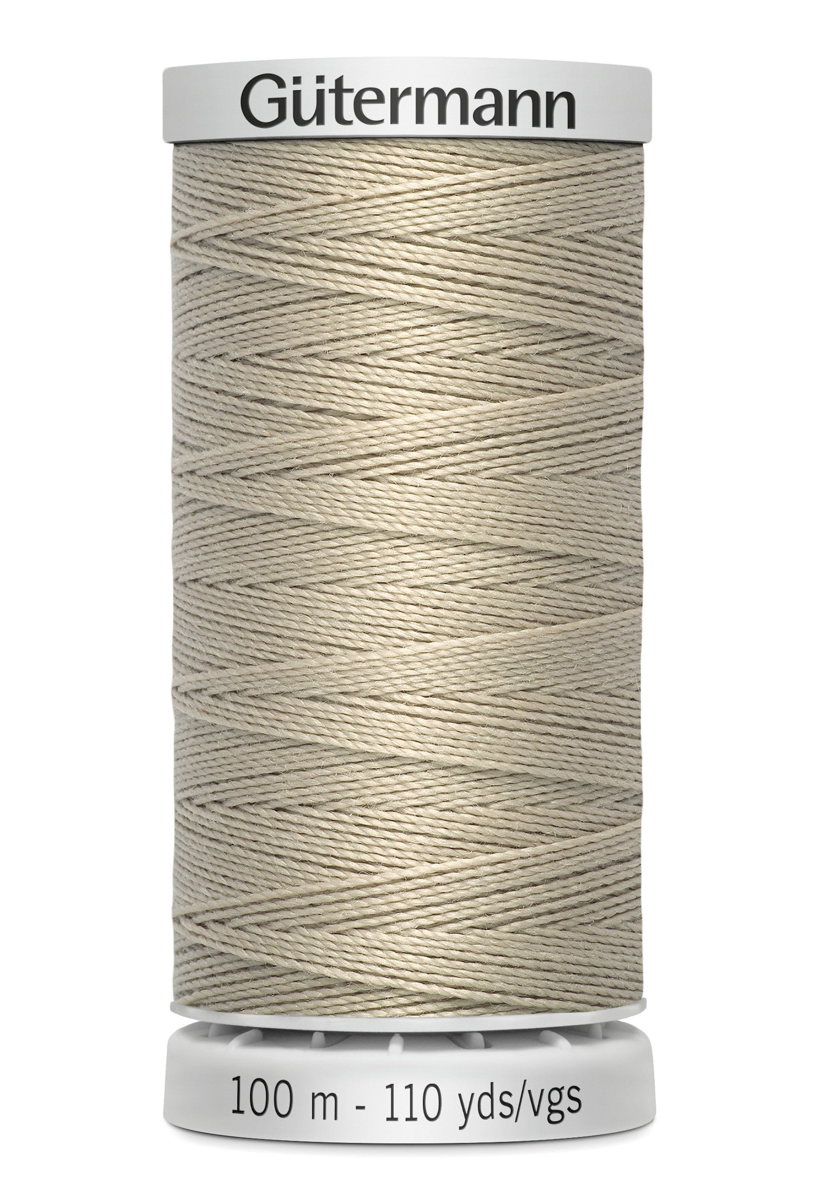 Spool of Gutermann thread on a white background