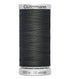 Spool of Gütermann thread on a white background